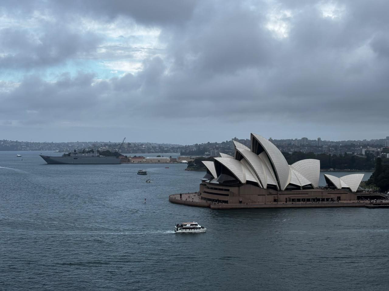 The Sydney Opera House under cloud, leaving Sydney